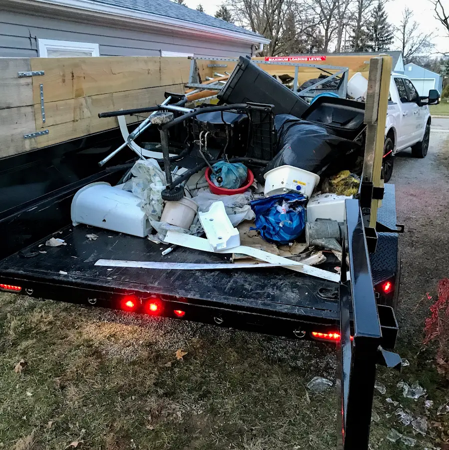 Roll-off dumpster delivered to a residential driveway in Bridgetown