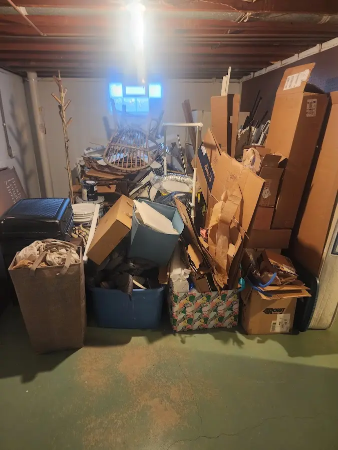 Roll-off dumpster container at job site for Cleanout Dumpster Rental in Bridgetown